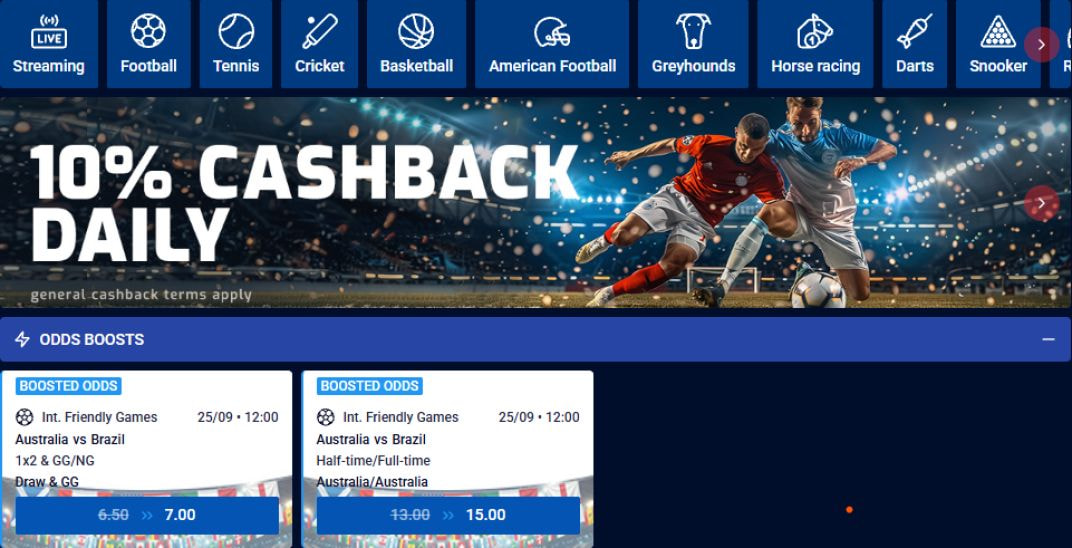 All British sportsbook lobby with a 10% Cashback Daily banner above two boosted-odds cards